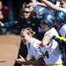The Michigan celebrates at home plate in the game against Louisiana-Lafayette on Friday, May 24. Daniel Brenner I AnnArbor.com